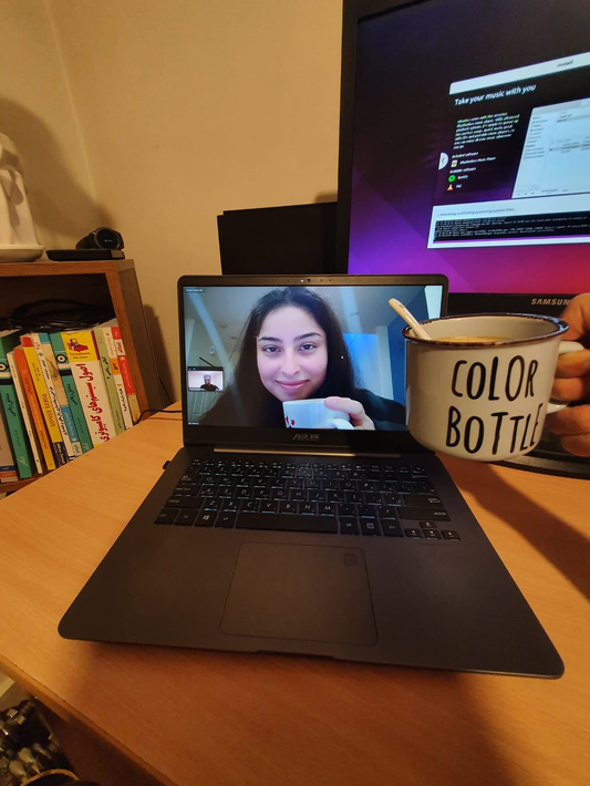 Facetime on computer with coffee