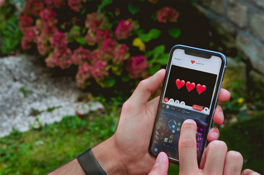 Person creating a lovebox message on their iphone.