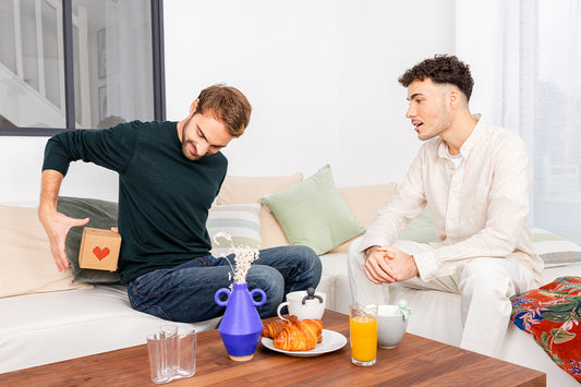 Man giving a gift to his boyfriend.